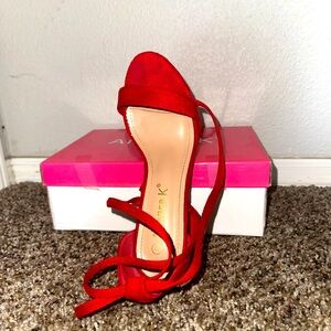 Used once for prom, red tie up heels, and comfortable to wear all night.